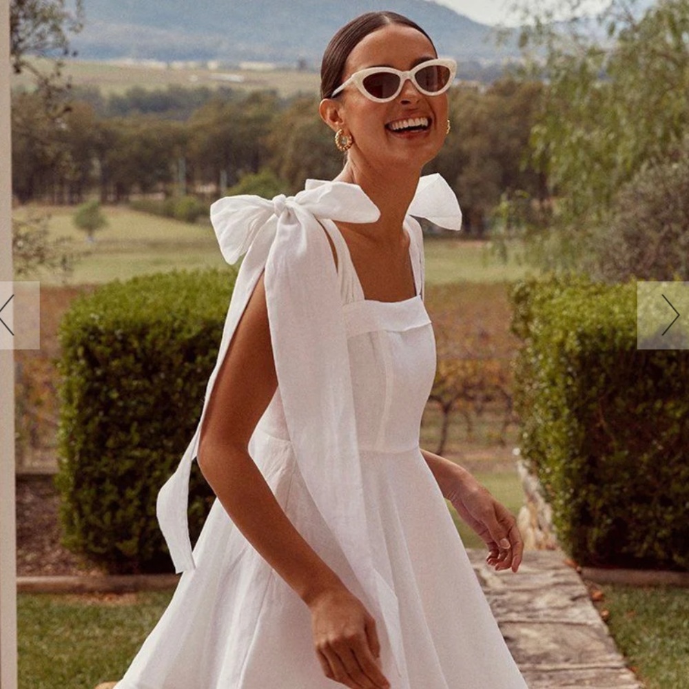 Dissh Aisle white linen bow mini dress, size 2